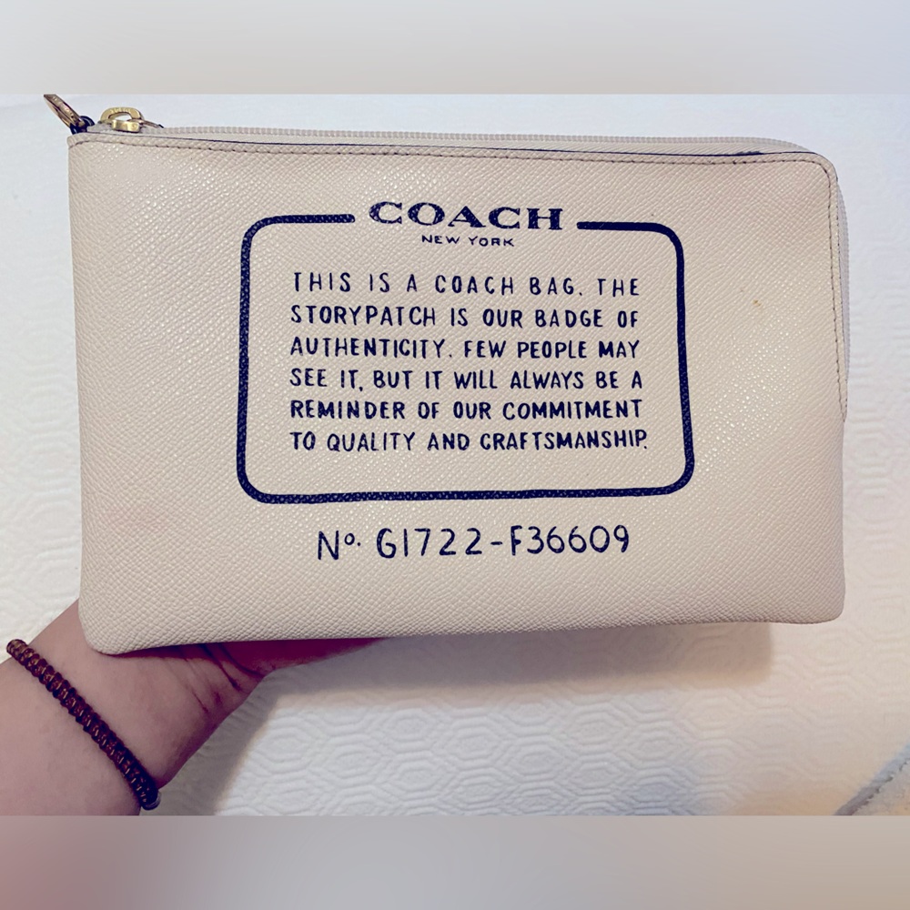 White Coach Bag with Badge of Authenticity Print